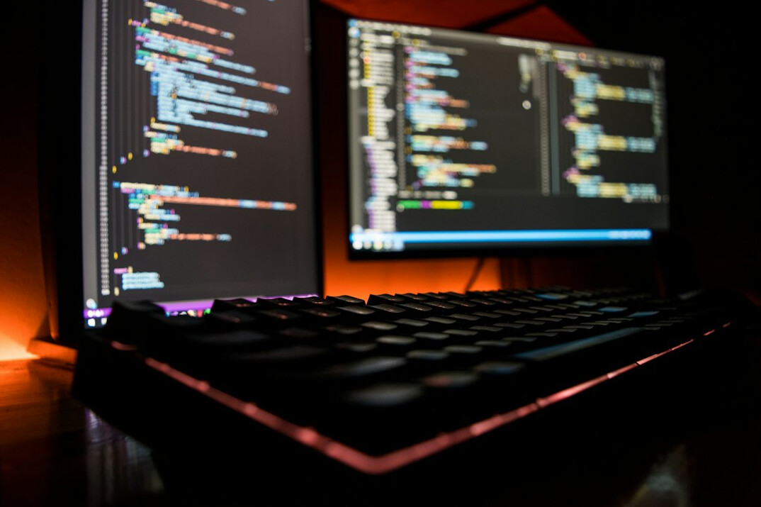 woman working on laptop code